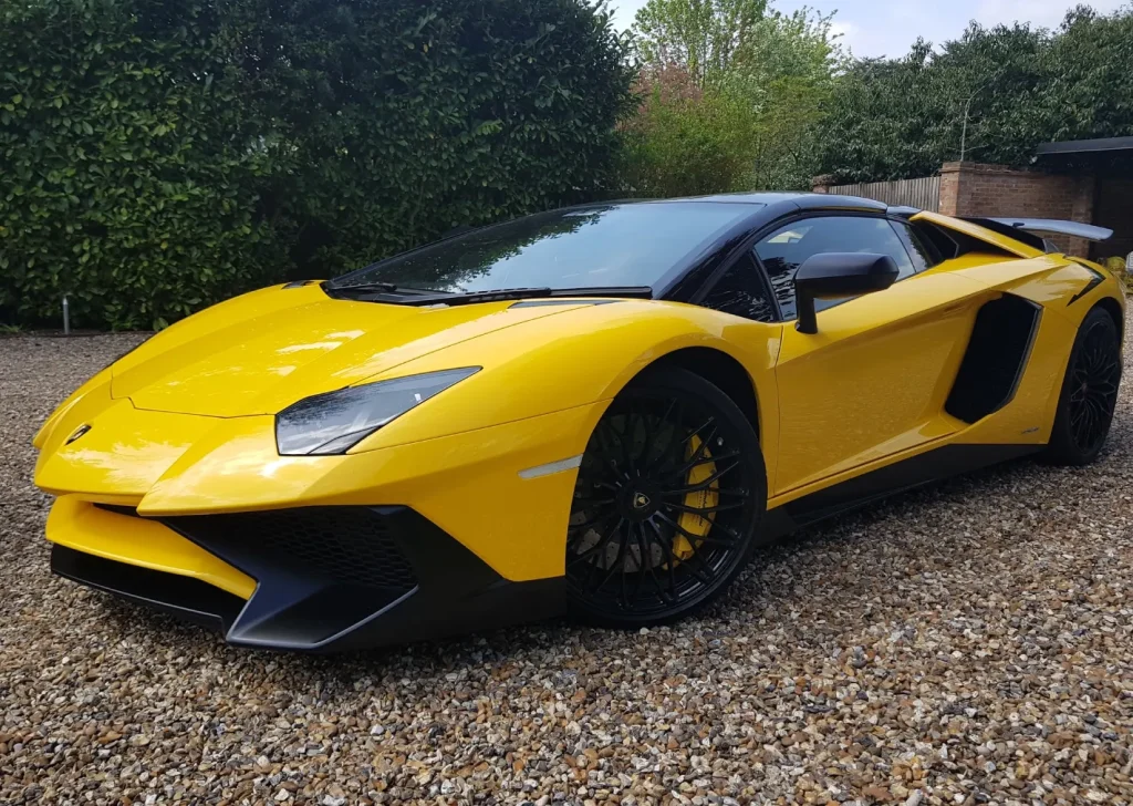 Luxury supercar transport service in Maidenhead featuring a yellow Lamborghini Aventador.